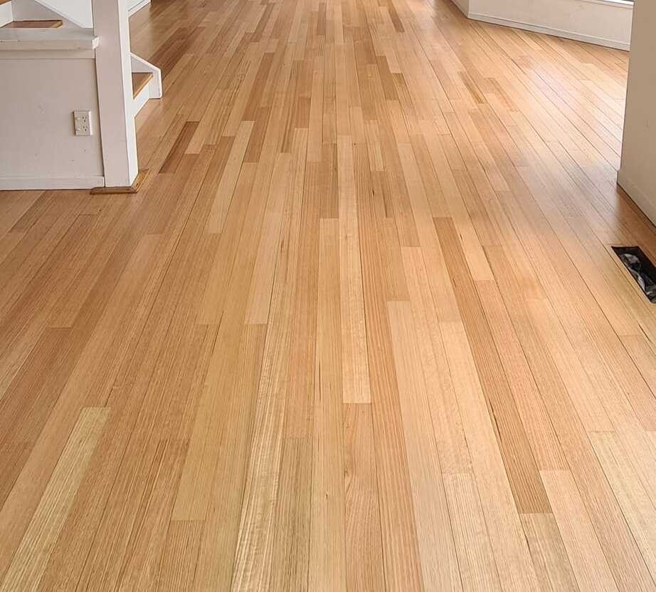 Refinished timber floor after sanding and polishing